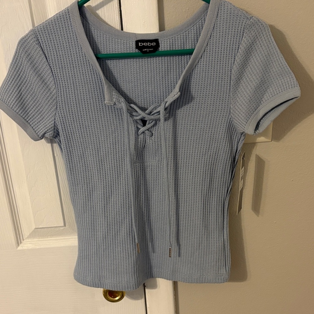 Nwt ladies/Jrs Baby Blue BEBE Top Sz M.